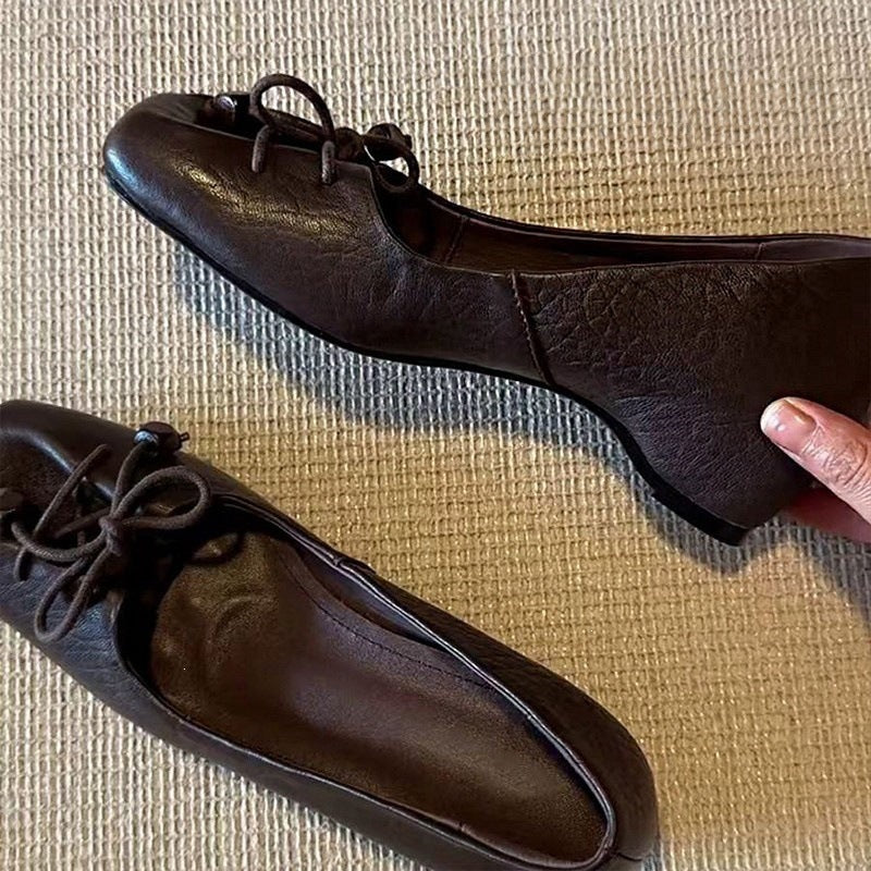Lace-up ballet flats
