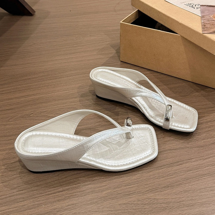 Minimalist Metallic Wedge Flip Flops