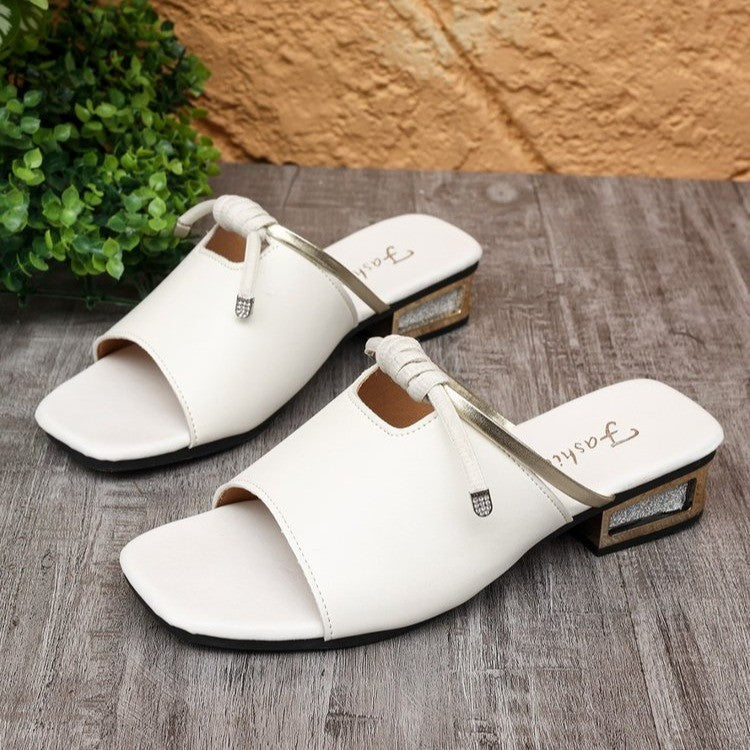 Bow-embellished mules